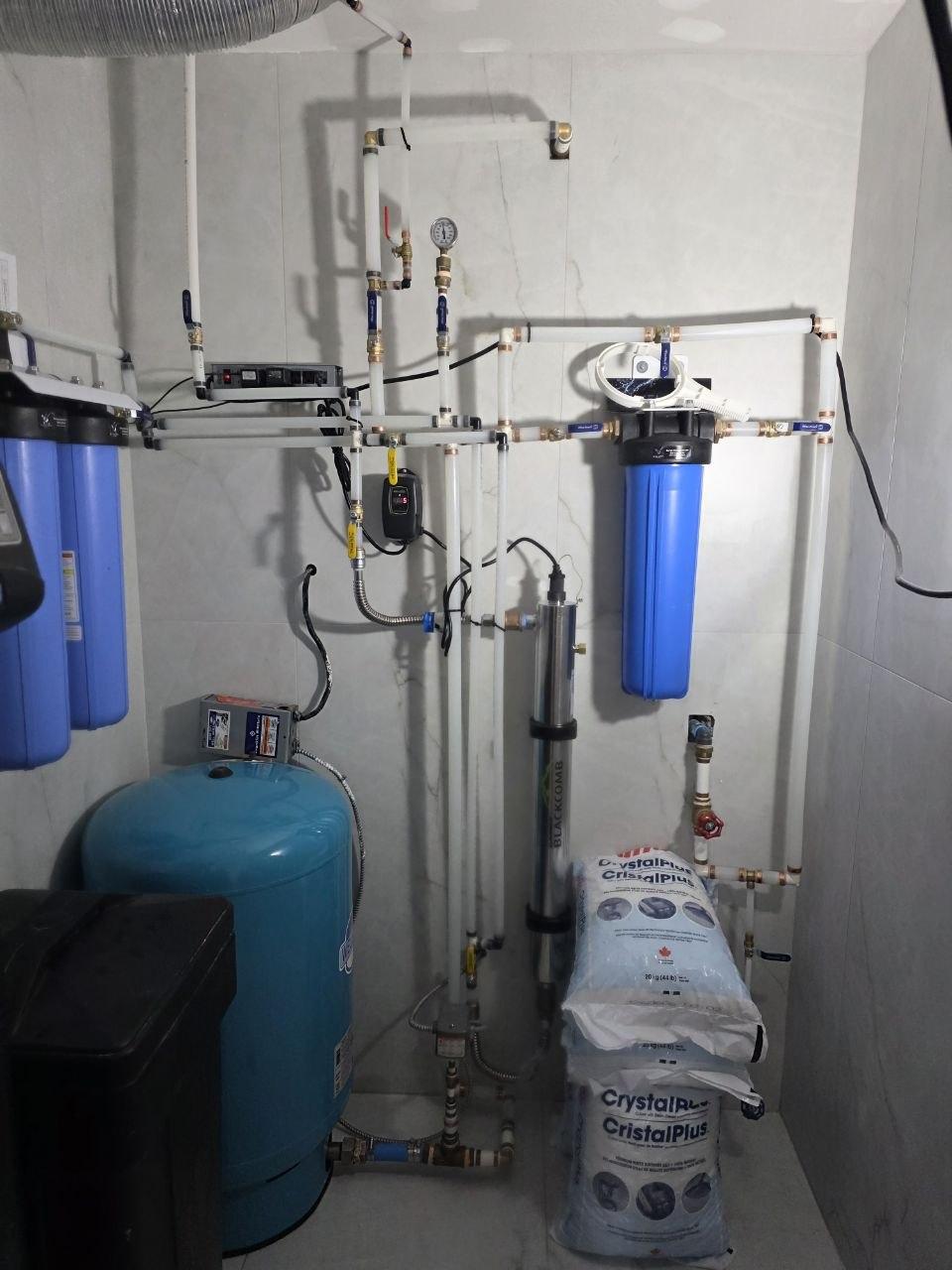 Velora installed filtration equipment with wall-mounted components